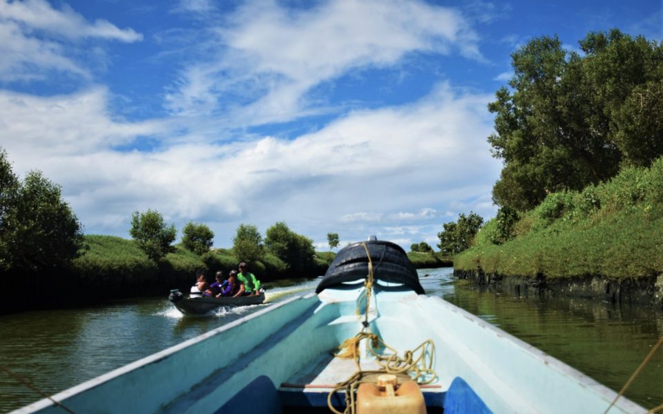 Commuting via boat ride is a common mode of transit for the coastal communities in Bulacan, Philippines.